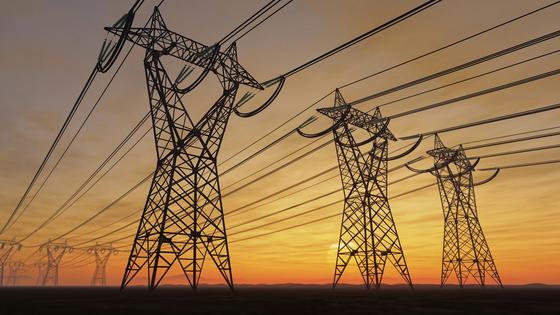 Transmission lines can carry power long distances, but the U.S. grids aren't all connected. imaginima/iStock/Getty Images Plus
