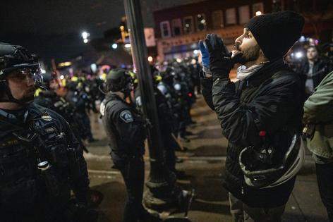 Minneapolis police officers arrest and scatter protesters on the campus of the University of Minnesota in Minneapolis on Feb. 5, 2026.
              Richard Tsong-Taatarii/The Minnesota Star Tribune via Getty Images