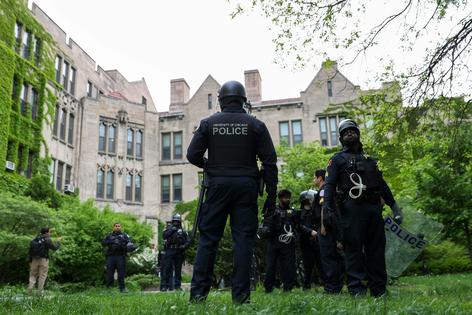 University of Chicago police patrol the campus after dismantling a pro-Palestine encampment on May 7, 2024.
              Alex Wroblewski/AFP via Getty Images
