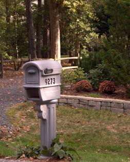 A good choice is a mailbox designed with a front and rear opening so it’s easy to open from either end. (Gene Hamilton/TCA)