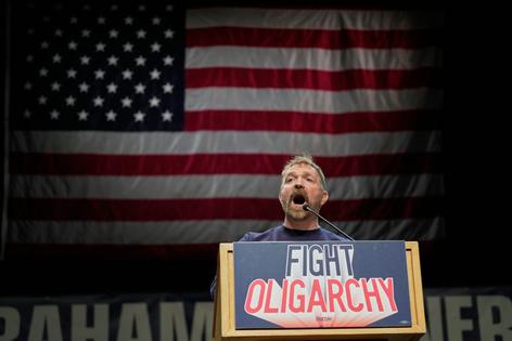 Graham Platner, Democratic candidate for U.S. Senate, speaks at an event hosted by U.S. Sen. Bernie Sanders in Orono, Maine, on May 24, 2026. AP Photo/Robert F. Bukaty
