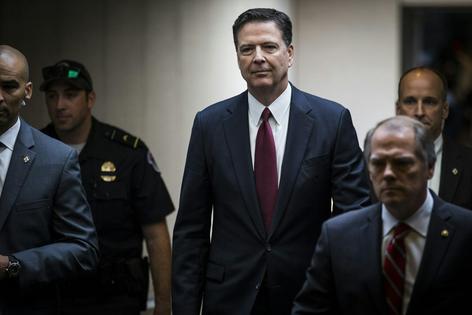 Did James Comey, former FBI director, 'knowingly and willfully' threaten, kidnap or 'inflict bodily injury upon the President of the United States'? Samuel Corum/Anadolu Agency/Getty Images
