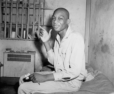 Willie Francis, 17, who was convicted of murdering a sheriff, sits in a prison cell in May 1946.
              AP Photo/Bill Allen