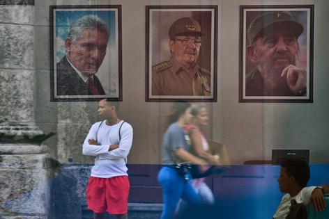 Images of Cuban President Miguel Díaz-Canel, Raúl Castro and Fidel Castro adorn the state building in Havana, Cuba, on May 20, 2026.
AP Photo/Ramon Espinosa