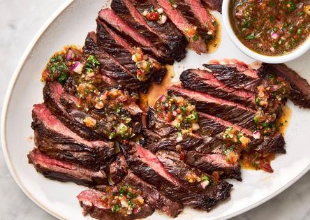 Skirt steak grills up quickly and is topped with juicy summer tomato salsa. (Rachel Vanni/TCA)