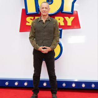 Bang Showbiz / Tom Hanks reveals when he and Toy Story 5 co-stars found out about Taylor Swift's soundtrack song