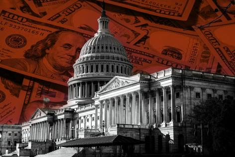 House members targeted by more super PAC activity were more likely to receive contributions from fellow party members.
              Greggory DiSalvo/Getty Images