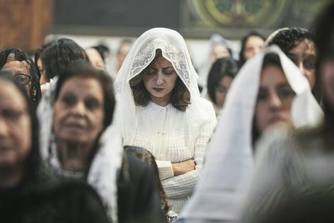 Coptic Orthodox worshippers attend Christmas prayers at Archangel Michael Church in Cairo, Egypt, on Jan. 6, 2026.
              AP Photo/Amr Nabil
