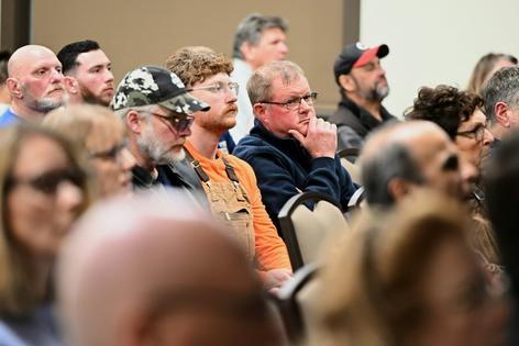 Residents of East Vincent Township in Pennsylvania listen during a supervisors meeting in December 2025 where an agenda item involved a data center proposal for the former Pennhurst state hospital grounds.
              AP Photo/Marc Levy