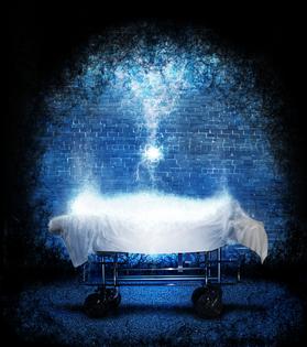 Body on gurney. Dreamstime/TCA