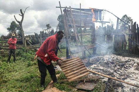 Kenyatta Ngusilo, a member of the Ogiek community, salvages what was left after his storehouse was burned down by Kenyan police in Sasimwani, in the Mau forest.
James Wakibia/SOPA Images/LightRocket via Getty Images