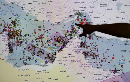 A man points toward the positions of ships in the Strait of Hormuz on a screen at the Maritime Information and Cooperation and Awareness Center in Brest, France, on April 27, 2026.
Fred Tanneau/AFP via Getty Images