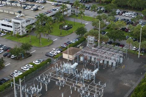 A power substation serves the NextEra Energy corporate headquarters in Juno, Fla.
              Marco Bello/Getty Images