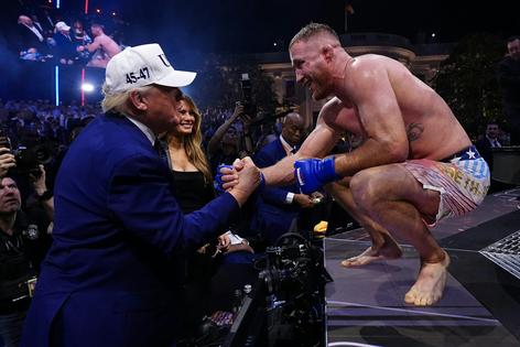Justin Gaethje shakes hands with President Donald Trump after winning the UFC lightweight title fight at the White House on June 14, 2026. Chris Unger Zuffa LLC/Getty Images