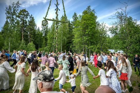 People gather for the traditional Midsummer celebrations in Gagnef, Sweden, on June 20, 2025.
Ulf Palm/TT News Agency/AFP via Getty Images