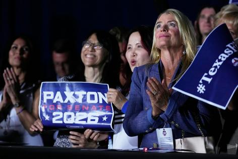 Supporters in Plano, Texas, celebrate Texas Attorney General Ken Paxton’s win on May 26, 2026.
              AP Photo/Tony Gutierrez