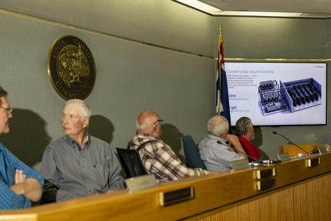 Local leaders, like these in Evanston, Wyo., are faced with questions, and potential opportunities, when data centers are proposed in their communities.
              Natalie Behring/Getty Images