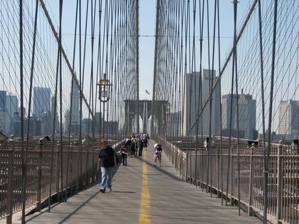 Walking across Brooklyn Bridge. Dreamstime/TCA