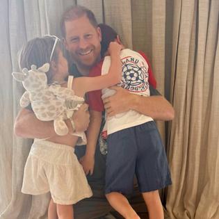 Bang Showbiz / Prince Harry has posed for a heartfelt Father's Day moment with his children Archie and Lilibet - with his son wearing an England football shirt