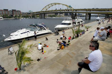 The three rivers define Pittsburgh, but swimming in them remains complicated.
AP Photo/Keith Srakocic