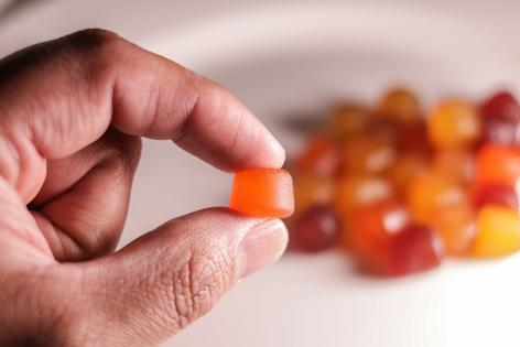 Melatonin gummies come in bright colors and enticing flavors, which can lead to harmful overdoses in children.
              Gerardo Juarez/iStock via Getty Images Plus