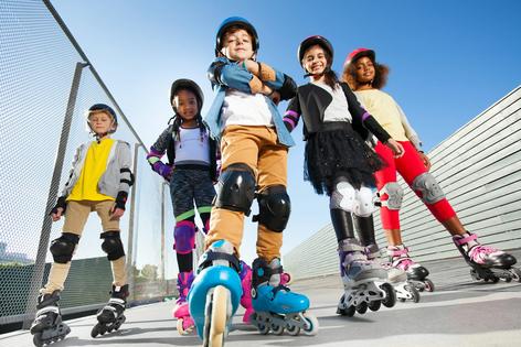 Children who see their parents wearing helmets are more likely to embrace wearing them too.
SerrNovik/iStock via Getty Images Plus