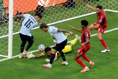 MIAMI GARDENS, FLORIDA - JUNE 21: Maxi Araujo #20 of Uruguay scores a goal that was disallowed due to an offside ruling during the FIFA World Cup 2026 Group H match between Uruguay and Cabo Verde at Miami Stadium on June 21, 2026 in Miami Gardens, Florida. (Photo by Molly Darlington/Getty Images)