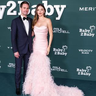 Bang Showbiz / Evan Spiegel and Miranda Kerr have helped ease debts for tens of thousands of people