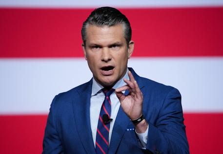 U.S. Secretary of Defense Pete Hegseth addresses senior military officers at Marine Corps Base Quantico in Quantico, Virginia, on Sept. 30, 2025. (Andrew Harnik/Pool/AFP/Getty Images/TNS)