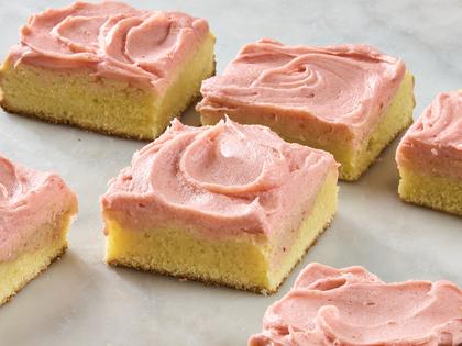 Strawberry frosting that is fruity and sweet is the perfect partner for tangy sour cream cookie bars. (Alex Lepe/TCA)