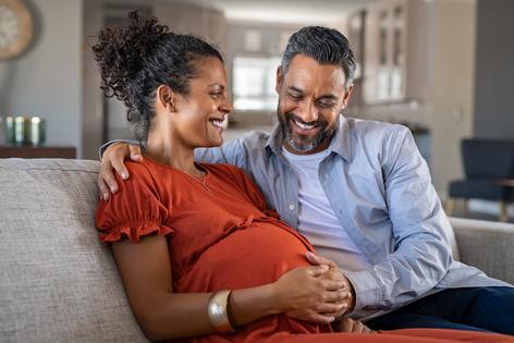 Couple expecting a baby. Dreamstime/TCA