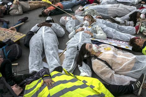 Protests around the world, including this one in Paris in 2019, have objected to the manufacturing and use of glyphosate, the active ingredient in the weed killer sold as Roundup.
              AP Photo/Rafael Yahgobzadeh