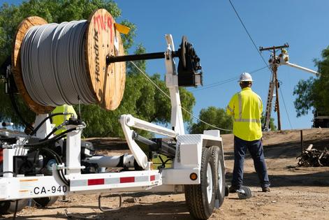A Southern California Edison crew installs new covered conductor power lines in Aguanga, Calif.
Elisa Ferrari/Southern California Edison