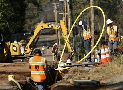 Burying power lines can keep the wind from blowing tree branches into them, but it can be prohibitively expensive, particularly where transmission lines pass through rugged mountains.
              AP Photo/Rich Pedroncelli
