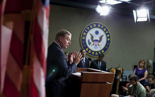 Sen. Lindsey Graham holds a news conference on Capitol Hill in Washington, D.C., on Oct. 8, 2013.  AP Photo/ Evan Vucci