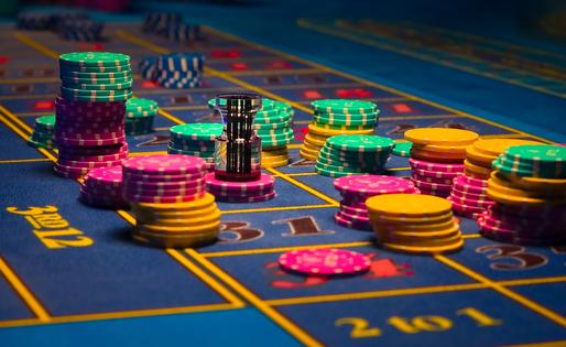 Gambling chips on table. Dreamstime/TCA