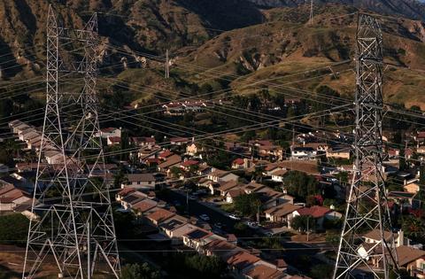 Meeting data center power demands will mean building more transmission lines and acquiring more land to put them on. These lines are in California. Justin Sullivan/Getty Images