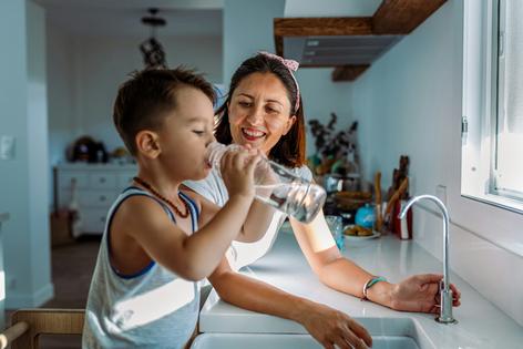 Philadelphia's tap water meets federal standards, but some residents may be concerned about elevated levels of PFAS, lead and sodium. Kemal Yildirim/E+ Collection via Getty Images