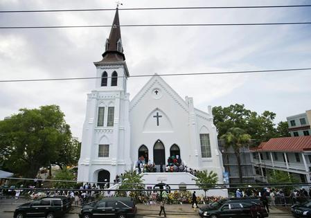 People line up to attend the June 2015 wake of Sen. Clementa Pinckney, one of the nine people killed in a shooting at Emanuel African Methodist Episcopal Church in Charleston, S.C.
David Goldman/AP Photo