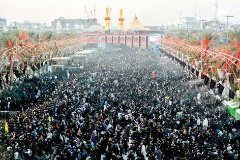 Pilgrims crowd the Imam Husayn shrine in Karbala, Iraq, during Arbaeen, one of the world's largest annual religious pilgrimages. MASTER/Moment via Getty Images