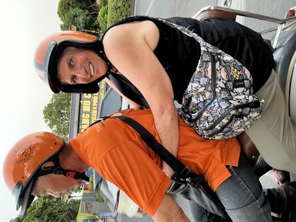 RIDING WITH VESPA ADVENTURES IN HO CHI MIHN CITY. Andy Yemma