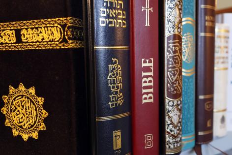 Religious books. Dreamstime/TCA