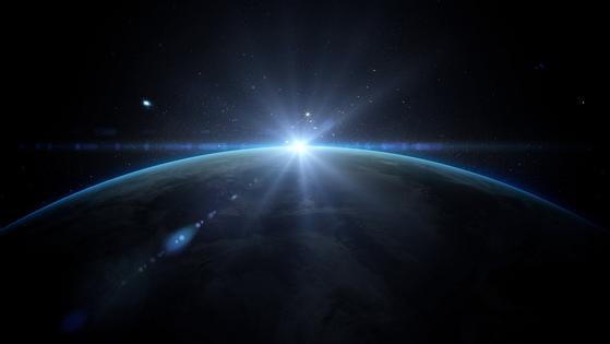 Sunrise over earth as seen from space. Dreamstime/TCA