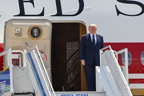 US President Donald Trump disembarks from Air Force One upon his arrival at Etimesgut Air Base near Ankara, on July 7, 2026, to attend the 36th NATO Heads of State and Government Summit. (Photo by Abdullah Güçlü / POOL / AFP via Getty Images). POOL/AFP via Getty Images