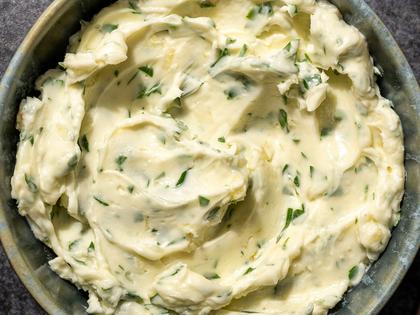 You only need four ingredients to make garlic butter that you can use on anything from bread to steaks to vegetables. (Eric Kleinberg/TCA)