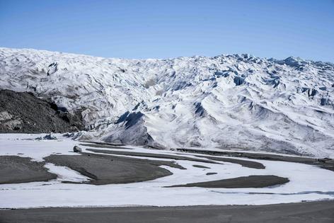 During ice ages, ice sheets like the one in Greenland have covered much of Earth's surface.  Thor Wegner/DeFodi Images via Getty Images