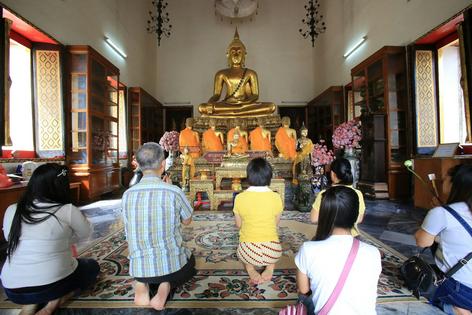 Buddhist daily practice in Thailand involves many rituals. Catherine Leblanc/Godong/Stone via Getty Images