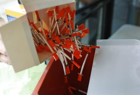 At needle exchanges, clients can discard their used needles and receive new ones.
              Al Seib/Los Angeles Times via Getty Images