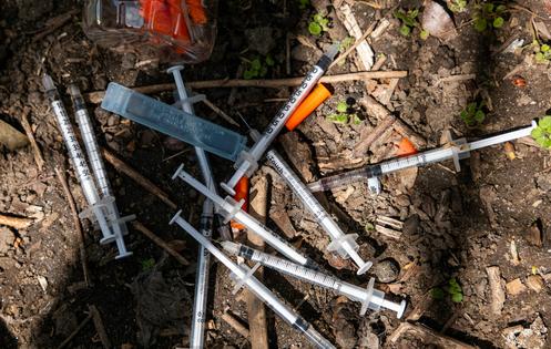 Critics of needle exchange programs often express concerns about syringe litter.  Spencer Platt/Getty Images 