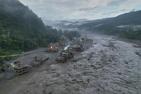 A drone view of the aftermath of flash flooding along the Trishuli River in Nuwakot district, Nepal, on Aug. 30, 2026. AP Photo/Rajesh Kumar Singh